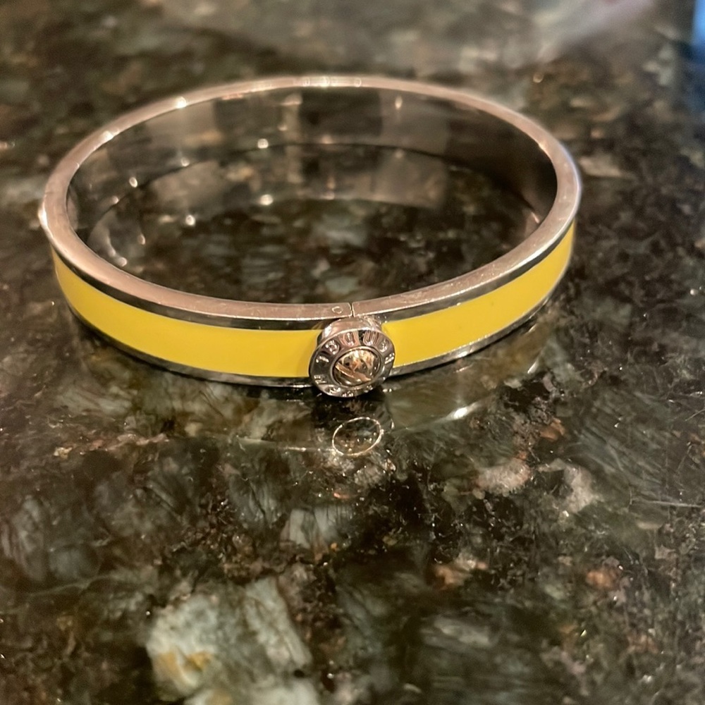 Henri Bendel click bracelet. Silver-toned